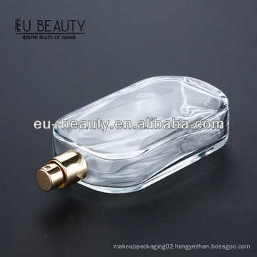 Clear empty perfume glass bottle with golden pump sprayer 100ml